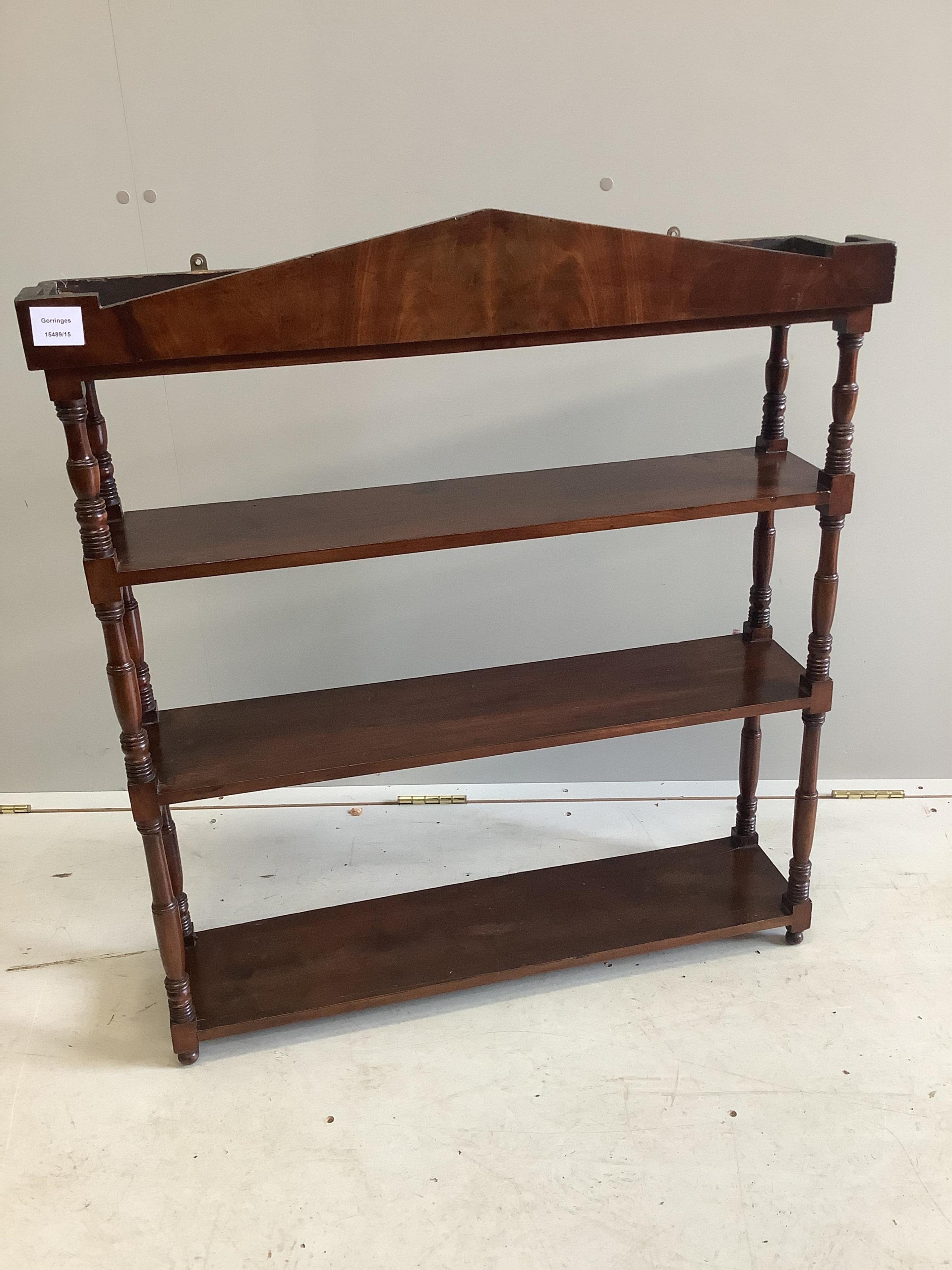 A Regency mahogany three tier wall bracket, width 81cm, depth 19cm, height 91cm. Condition - fair